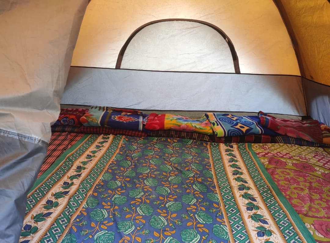 Interior bedding prepared for a Pawna Lake camping stay