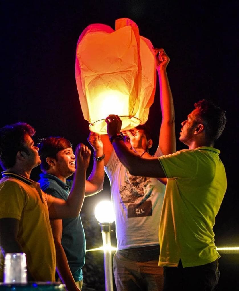 Group celebration during Pawna Lake camping